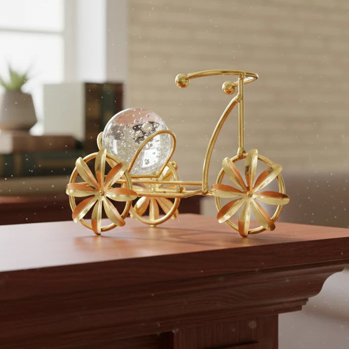 Metal cycle holding Glass Ball