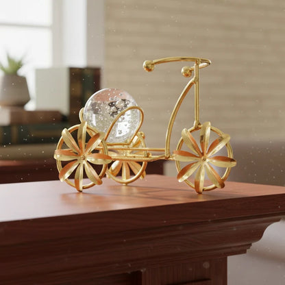 Metal cycle holding Glass Ball